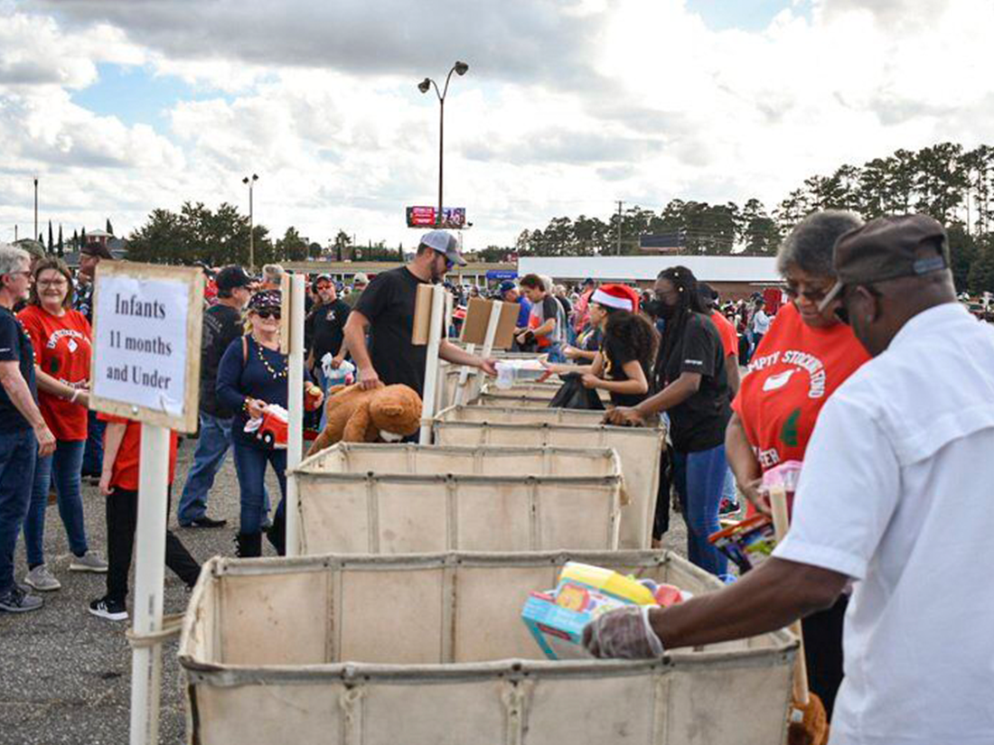 Capt-Tasha-Thomas-and-riders-donating Bryce Ethridge | The Valdosta Daily TimesSalvation Army Capt. Tasha Thomas said with about 1,000 riders bringing in at least one toy, she estimated they brought in at least 1,000 toys. She has been buying even more toys with the Empty Stocking Fund